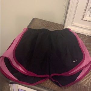 Black and pink nike shorts